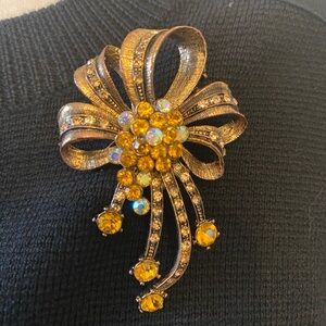 Vintage Gold Tone Bow Brooch Clear And Yellow Rhinestone Embellished Ornate
